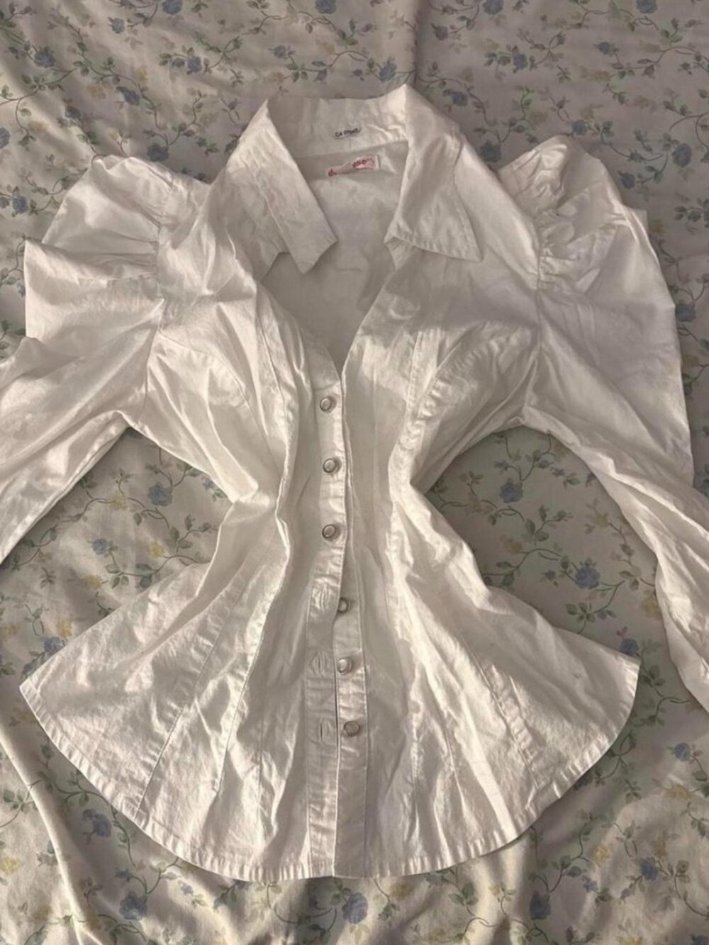 Cute vintage button-up blouse with puff sleeves and pearl buttons